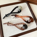 Prendedor de cabelo Feminino - Elegante e Versátil - Praiamar da cabeça aos pés!!